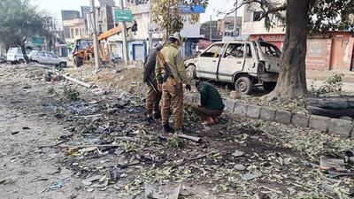 The NIA team at the bast site in Jammu’s Narwal area on Sunday. (ANI Photo) The NIA team at the bast site in Jammu’s Narwal area on Sunday. (ANI Photo)