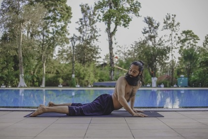 Twisted Cobra Pose (Triyaka Bhujangasana) (Photo by Himalayan Siddhaa Akshar) Twisted Cobra Pose (Triyaka Bhujangasana) (Photo by Himalayan Siddhaa Akshar)