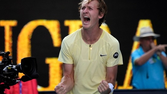 Sebastian Korda of the U.S. celebrates after defeating Hubert Hurkacz of Poland during their fourth round match at the Australian Open tennis championship in Melbourne.(AP)