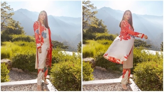Karisma Kapoor loves travelling whether it is with her friends or family. Her Instagram handle features several images of herself from various different locations around the globe. In her previous post, the actor can be seen flaunting her red floral contemporary kurta in the hills of Rishikesh in Uttarakhand.(Instagram/@therealkarismakapoor)