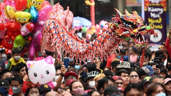 Many people could finally make their first trip back to their hometowns to reunite with their families due to the easing of COVID restrictions. (AFP)