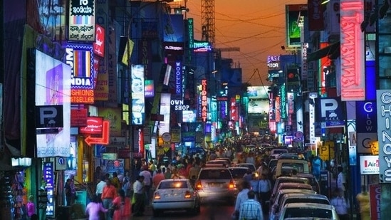 Commercial Street, Bengaluru: Bangalore, the state capital of Karnataka, India, is home to Commercial Street. The street, one of the city's oldest and largest shopping streets, is well-known for its commerce in apparel, accessories, jewellery, electronics, and fast food establishments.(pinterest)