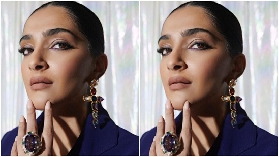 In the end, Sonam styled the look with black suede boots, a matching top handle black bag, precious stone-adorned cross-shaped earrings and matching statement rings. A centre-parted braided hairdo, subtle eye shadow, winged eyeliner, nude lip shade, feathered brows and blushed cheeks rounded it all off.&nbsp;(Instagram)