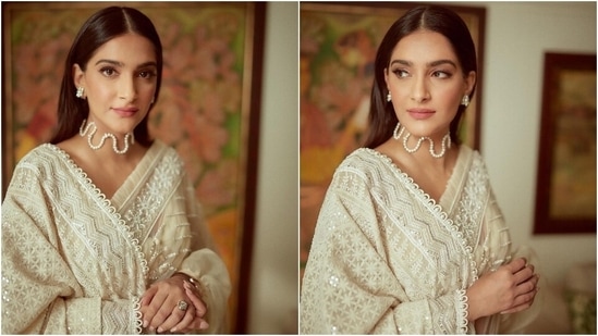 Sonam accessorised the six yards with a pearl swirl-shaped necklace, matching floral earrings, an elegant watch, and a diamond ring. Lastly, centre-parted open tresses, baby pink lip shade, winged eyeliner, subtle eye shadow and minimal blushed base rounded off the glam picks.&nbsp;(Instagram)