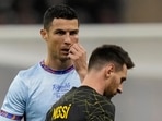 Cristiano Ronaldo and Lionel Messi during an exhibition match.(AP) Cristiano Ronaldo and Lionel Messi during an exhibition match.(AP)
