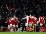 Arsenal's Eddie Nketiah celebrates with teammates after scoring his side's third goal(AP) Arsenal's Eddie Nketiah celebrates with teammates after scoring his side's third goal(AP)
