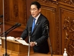 Japan's Prime Minister Fumio Kishida delivers a policy speech at the Ordinary Diet session in Tokyo on January 23, 2023. (Photo by Yuichi YAMAZAKI/AFP)