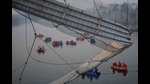 A forensic science laboratory report revealed that rusty cables, broken anchor pins and loose bolts were among the lapses that were not addressed while renovating the suspension bridge. (AP) A forensic science laboratory report revealed that rusty cables, broken anchor pins and loose bolts were among the lapses that were not addressed while renovating the suspension bridge. (AP)