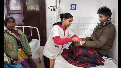 A man undergoes treatment after allegedly consuming spurious liquor in Siwan district on Monday. (PTI) A man undergoes treatment after allegedly consuming spurious liquor in Siwan district on Monday. (PTI)
