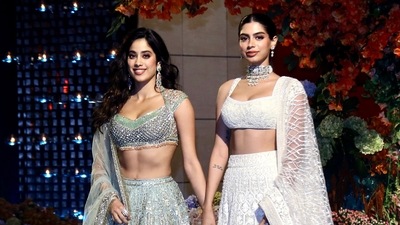 Janhvi Kapoor and her sister Khushi Kapoor pose for the paparazz at the engagement ceremony of Reliance Industries Chairman and Managing Director Mukesh Ambani's son Anant Ambani and Radhika Merchant. (ANI) Janhvi Kapoor and her sister Khushi Kapoor pose for the paparazz at the engagement ceremony of Reliance Industries Chairman and Managing Director Mukesh Ambani's son Anant Ambani and Radhika Merchant. (ANI)