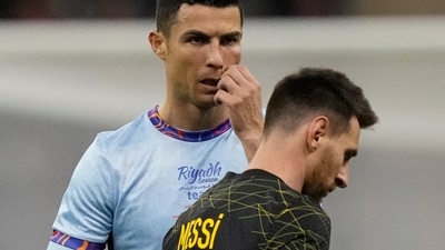 Cristiano Ronaldo and Lionel Messi during an exhibition match. (AP) Cristiano Ronaldo and Lionel Messi during an exhibition match. (AP)