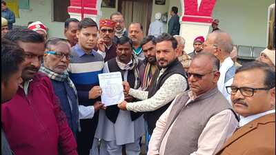 Families of the plane crash victims from UP, at the Varanasi DM office on Monday (Sourced)