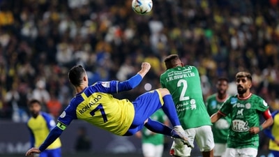 Cristiano Ronaldo in action with Al Ettifaq's Saeed Al-Mowalad (REUTERS)