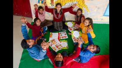 Students reading comic books in a UP school. (Sourced)