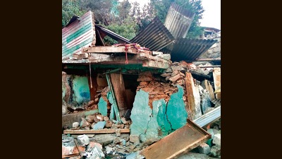 The house which collapsed in Joshimath on Sunday. (HT Photo) The house which collapsed in Joshimath on Sunday. (HT Photo)