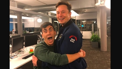The image shows YouTuber Fidias Panayiotou hugging Elon Musk. (Twitter/@Fidias0)