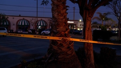 Officials worked into Monday trying to identify the 10 people he killed on Saturday night at the Star Ballroom Dance Studio in Monterey Park, about 7 miles (11 km) east of downtown Los Angeles. (Getty Images via AFP) Officials worked into Monday trying to identify the 10 people he killed on Saturday night at the Star Ballroom Dance Studio in Monterey Park, about 7 miles (11 km) east of downtown Los Angeles. (Getty Images via AFP)