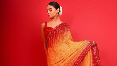 Alia Bhatt looks ethereal in a yellow and red dual ombre-toned bandhani saree (Photo: Instagram) (Instagram/@Aliabhatt) Alia Bhatt looks ethereal in a yellow and red dual ombre-toned bandhani saree (Photo: Instagram) (Instagram/@Aliabhatt)