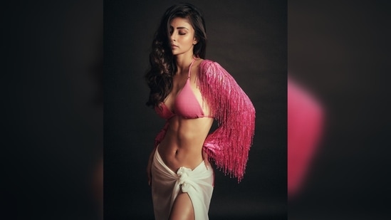 Mouni Roy shared a string of photos of herself on her Instagram handle and captioned her post, "Bewitched bothered and bewildered, am I ?." (Instagram/@imouniroy)