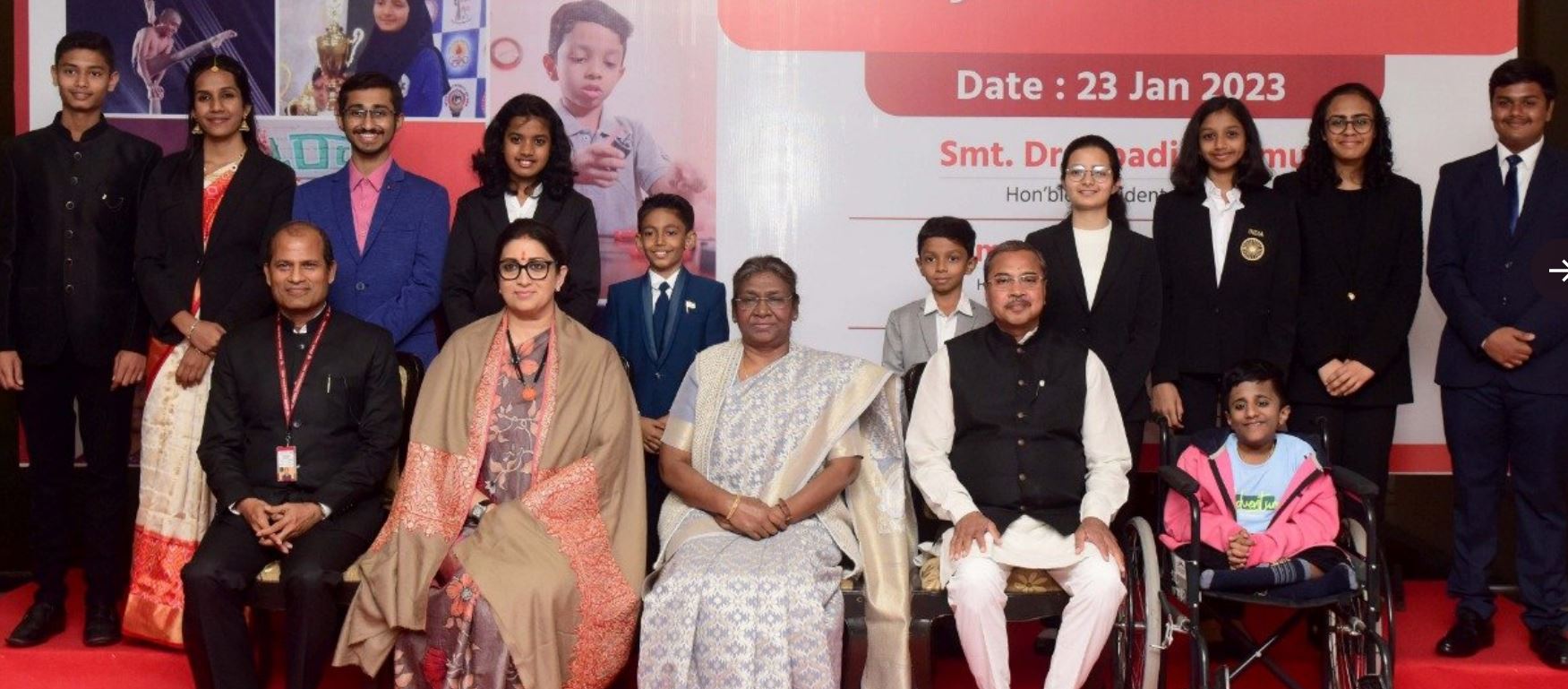 President Droupadi Murmu with 11 children at an award ceremony held in Delhi today. (ANI)
