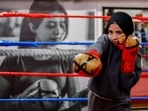 A young Palestinian girl warms up during a training session inside the first women's boxing center in Gaza City, on January 17. Boxing has helped young women find a release from the daily stresses of life in Gaza, a narrow coastal strip where some 2.3 million Palestinians live blockaded by both Israel and neighbouring Egypt. (Mohammed Salem / REUTERS)