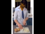 The image is taken from the onion cutting-related viral video that Shahid Kapoor shared on Instagram.