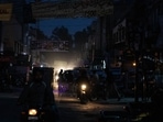 A dark street in a commercial area in Lahore, Pakistan, on Monday, Jan. 23, 2023. Millions of people across Pakistans major cities were plunged into a blackout prompted by a power grid failure, dealing another blow to the nation already reeling from surging energy costs. Photographer: Betsy Joles/Bloomberg(Bloomberg) A dark street in a commercial area in Lahore, Pakistan, on Monday, Jan. 23, 2023. Millions of people across Pakistans major cities were plunged into a blackout prompted by a power grid failure, dealing another blow to the nation already reeling from surging energy costs. Photographer: Betsy Joles/Bloomberg(Bloomberg)
