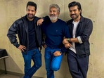 Actors Jr NTR and Ram Charan with RRR director SS Rajamouli. Actors Jr NTR and Ram Charan with RRR director SS Rajamouli.