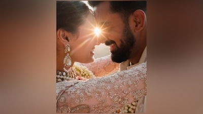 Meanwhile, KL Rahul complemented Athiya in an ivory three-piece sherwani set featuring an embroidered bandhgala jacket, chikankari kurta and straight-fit pyjamas. He rounded it all off with a layered necklace, a metal bracelet watch, and a side-parted sleek hairdo. (Instagram) Meanwhile, KL Rahul complemented Athiya in an ivory three-piece sherwani set featuring an embroidered bandhgala jacket, chikankari kurta and straight-fit pyjamas. He rounded it all off with a layered necklace, a metal bracelet watch, and a side-parted sleek hairdo. (Instagram)