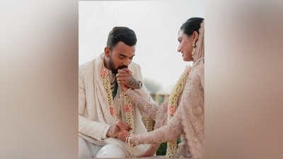In the end, Athiya chose blushed glowing skin, blush pink eyeshadow, nude pink lips, eyelids lined with kohl, a light hint of mascara on the lashes, feathered eyebrows and a dainty bindi for the glam picks. A centre-parted sleek braided bun rounded it all off. (Instagram) In the end, Athiya chose blushed glowing skin, blush pink eyeshadow, nude pink lips, eyelids lined with kohl, a light hint of mascara on the lashes, feathered eyebrows and a dainty bindi for the glam picks. A centre-parted sleek braided bun rounded it all off. (Instagram)