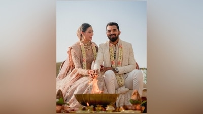Athiya accessorised the delicate handmade and handwoven piece with gold, pearl and Kundan-adorned jewellery pieces, including a heavy choker necklace, mang tika, jhumkis, and kadhas. She rounded it off with light pink-coloured embroidered block heel juttis. (Instagram) Athiya accessorised the delicate handmade and handwoven piece with gold, pearl and Kundan-adorned jewellery pieces, including a heavy choker necklace, mang tika, jhumkis, and kadhas. She rounded it off with light pink-coloured embroidered block heel juttis. (Instagram)