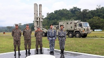 Chief of Defence Staff Gen Anil Chauhan standing in front of a mobile surface-to-air missile launcher in Andaman and Nicobar Islands today. Chief of Defence Staff Gen Anil Chauhan standing in front of a mobile surface-to-air missile launcher in Andaman and Nicobar Islands today.