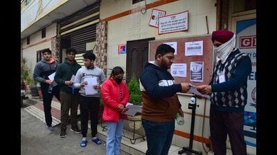 Roll numbers of the students checked by the authorities before entering the examination hall for Joint Entrance Examination (JEE Main) at Guru Nanak Computer centre in Ludhiana on Tuesday (Harvinder Singh/HT)