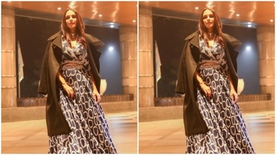 Neha looked every bit gorgeous in the blue blouse embellished in silver sequins and featuring long sleeves and a plunging neckline. (Instagram/@nehadhupia) Neha looked every bit gorgeous in the blue blouse embellished in silver sequins and featuring long sleeves and a plunging neckline. (Instagram/@nehadhupia)