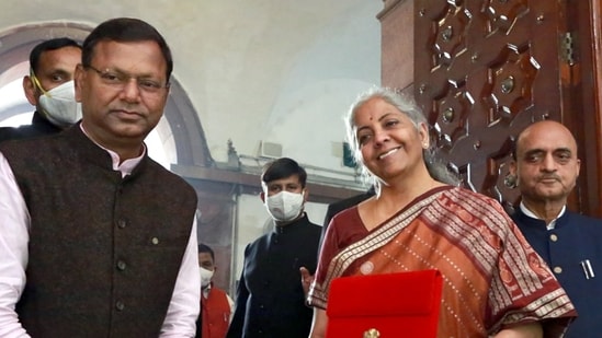Union Finance Minister Nirmala Sitharaman along with the Ministers of State for Finance Pankaj Chaudhary and Bhagwat Karad arrives at Parliament ahead of the Union Budget 2022-23 presentation in Lok Sabha, in New Delhi on Tuesday. (Amlan Paliwal)