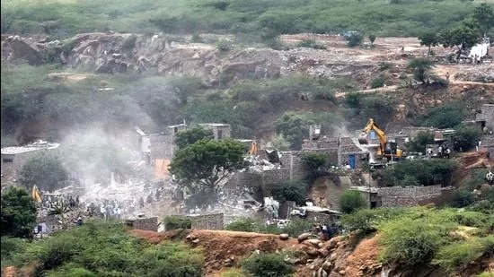 A demolition drive at Khori Gaon village, which came up on Aravalli land in Faridabad. (HT File)