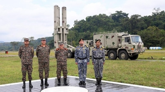 Chief of Defence Staff Gen Anil Chauhan standing in front of a mobile surface-to-air missile launcher in Andaman and Nicobar Islands today.