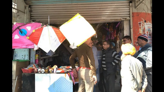 Officials from the district and police administration inspected selling points of banned plastic kite string in various areas of in Ludhiana. (HT file photo)