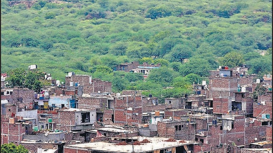 The Supreme Court in 2022 ordered structures in Faridabad’s Lakkarpur Khori village, illegally built in the Aravallis, to be demolished. (HT Photo)
