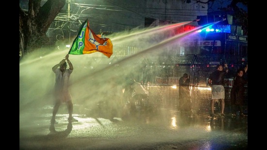 Thiruvananthapuram: Police personnel use water cannon to disperse the BJP activists during their protest against the alleged screening of the BBC documentary 'India: The Modi Question', in Thiruvananthapuram, Tuesday, Jan. 24, 2023. (PTI Photo) (PTI01_24_2023_000311A) (PTI) Thiruvananthapuram: Police personnel use water cannon to disperse the BJP activists during their protest against the alleged screening of the BBC documentary 'India: The Modi Question', in Thiruvananthapuram, Tuesday, Jan. 24, 2023. (PTI Photo) (PTI01_24_2023_000311A) (PTI)
