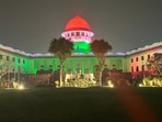 Supreme Court illuminated in Tricolour on the eve of Republic Day.(ANI)