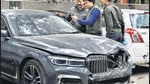 Police officials take a look at the BMW car involved in a hit-and-run accident in south Delhi’s Munirka area on Tuesday. A local pushcart vendor was killed in the accident. (Vipin Kumar/HT photo) Police officials take a look at the BMW car involved in a hit-and-run accident in south Delhi’s Munirka area on Tuesday. A local pushcart vendor was killed in the accident. (Vipin Kumar/HT photo)