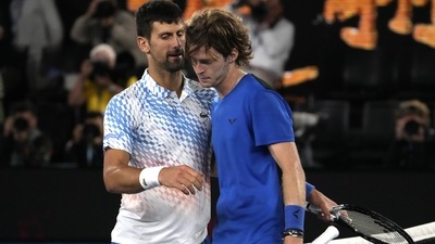 Novak Djokovic is congratulated by Andrey Rublev following their quarterfinal match at the Australian Open (AP)