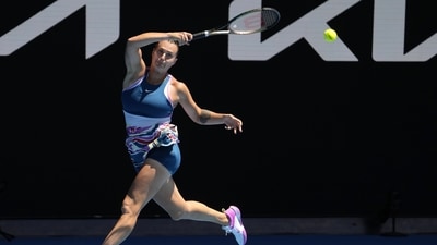 Aryna Sabalenka of Belarus plays a forehand return to Donna Vekic of Croatia during their quarterfinal match at the Australian Open tennis championship in Melbourne, Australia, Wednesday, Jan. 25, 2023. (AP Photo/Ng Han Guan) (AP) Aryna Sabalenka of Belarus plays a forehand return to Donna Vekic of Croatia during their quarterfinal match at the Australian Open tennis championship in Melbourne, Australia, Wednesday, Jan. 25, 2023. (AP Photo/Ng Han Guan) (AP)