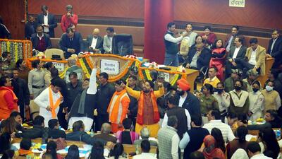 Councillors raise slogans in the House at Civic Centre on Tuesday. (ANI) Councillors raise slogans in the House at Civic Centre on Tuesday. (ANI)