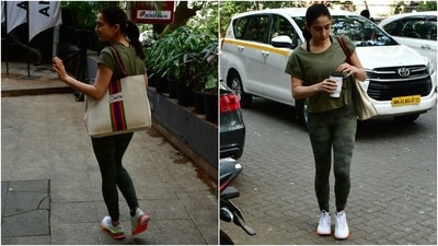 Sara Ali Khan wore a green-toned outfit to hit the gym. The star served workout fashion inspiration for her fans in the comfy and fuss-free look featuring a round-neck tee and printed yoga tights. The tee comes with half-length sleeves and a loose fitting. (HT Photo/Varinder Chawla) Sara Ali Khan wore a green-toned outfit to hit the gym. The star served workout fashion inspiration for her fans in the comfy and fuss-free look featuring a round-neck tee and printed yoga tights. The tee comes with half-length sleeves and a loose fitting. (HT Photo/Varinder Chawla)