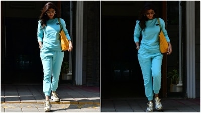 In the end, Shilpa chose chunky lace-up sneakers, a metal bracelet watch, sleek bracelets, broad sunglasses, gold hoop earrings, a Goyard tote bag, open tresses and minimal makeup to accessorise the athleisure fit. (HT Photo/Varinder Chawla) In the end, Shilpa chose chunky lace-up sneakers, a metal bracelet watch, sleek bracelets, broad sunglasses, gold hoop earrings, a Goyard tote bag, open tresses and minimal makeup to accessorise the athleisure fit. (HT Photo/Varinder Chawla)