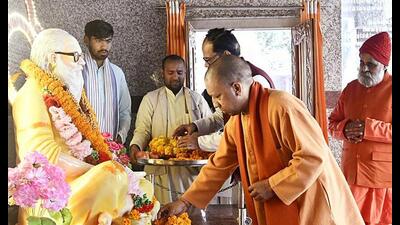 UP chief minister Yogi Adityanath offers prayers at Shri Gorakhnath Temple, in Gorakhpur on Tuesday. (ANI Photo)
