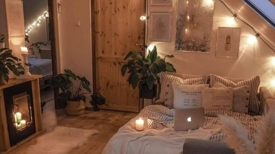 Use lighting to create a warm ambiance: Lighting can have a huge impact on the overall feel of a room. Opt for warm, soft lighting to create a cosy atmosphere. This can be achieved through the use of table lamps, floor lamps, and candles. (Pinterest) Use lighting to create a warm ambiance: Lighting can have a huge impact on the overall feel of a room. Opt for warm, soft lighting to create a cosy atmosphere. This can be achieved through the use of table lamps, floor lamps, and candles. (Pinterest)