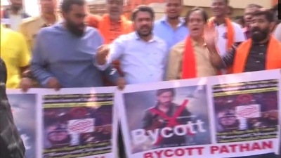 VHP workers burn 'Pathaan' posters, raise anti-SRK, Deepika slogans in Bengaluru VHP workers burn 'Pathaan' posters, raise anti-SRK, Deepika slogans in Bengaluru